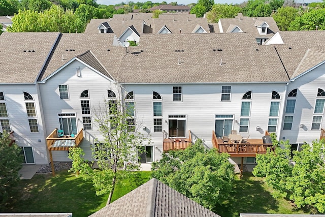 1353 White Oak Dr, Chaska, MN 55318 - back of house featuring roof with shingles and a residential view