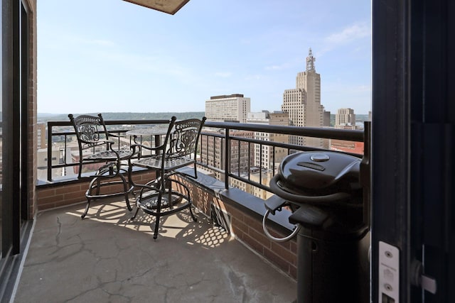 balcony featuring a view of city