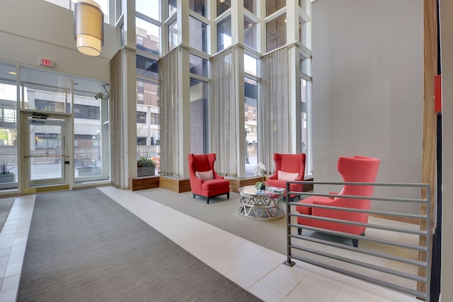 building lobby featuring a towering ceiling
