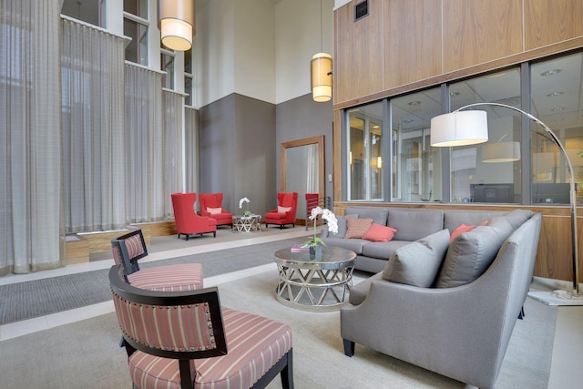 building lobby featuring a towering ceiling