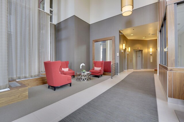building lobby featuring a high ceiling