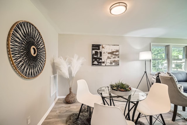 6670 Hopi Rd, Chanhassen, MN 55317 - dining space with wood finished floors and baseboards