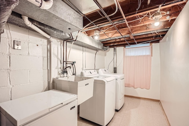 6670 Hopi Rd, Chanhassen, MN 55317 - laundry room featuring light floors, independent washer and dryer, and baseboards