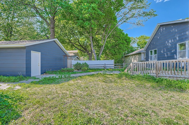 6670 Hopi Rd, Chanhassen, MN 55317 - view of yard with an outdoor structure and a deck