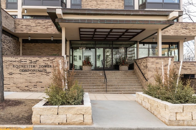 207 5th Ave SW Unit 407, Rochester, MN 55902 - doorway to property featuring brick siding