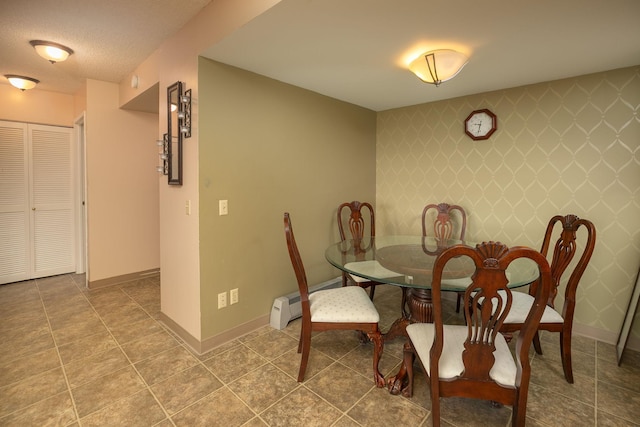 207 5th Ave SW Unit 407, Rochester, MN 55902 - tiled dining room with baseboards, a baseboard radiator, and an accent wall