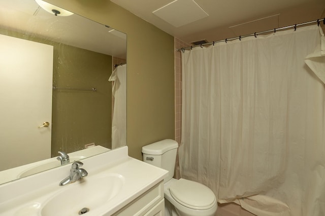 207 5th Ave SW Unit 407, Rochester, MN 55902 - bathroom with vanity, toilet, and a shower with shower curtain