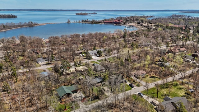 aerial view of property's location with a nearby body of water