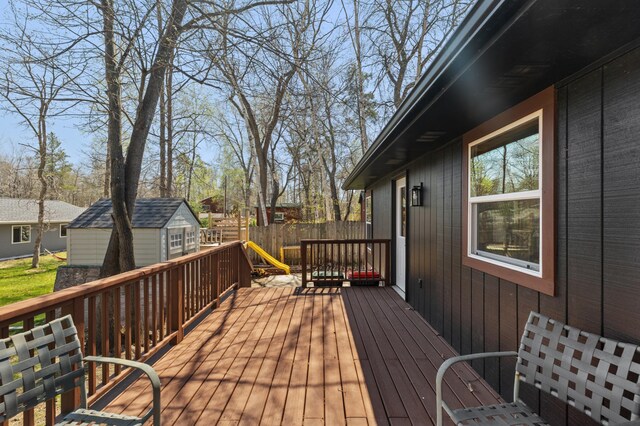 30432 Pinewood Dr, Breezy Point, MN 56472 - wooden deck featuring an outbuilding