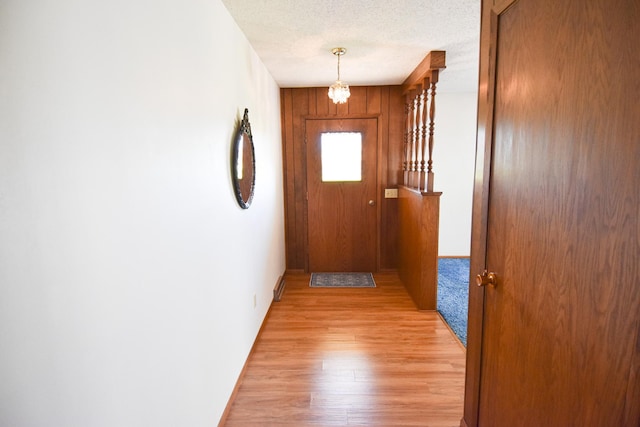 13946 151st St NE, Thief River Falls, MN 56701 - entryway featuring light wood-type flooring and a textured ceiling