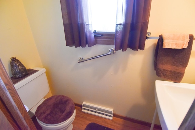 13946 151st St NE, Thief River Falls, MN 56701 - bathroom featuring toilet and wood finished floors