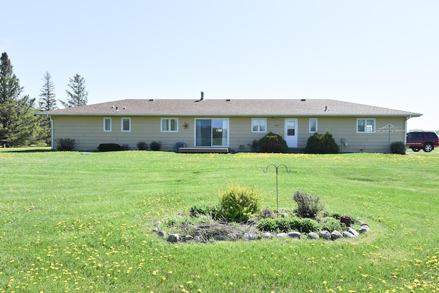 13946 151st St NE, Thief River Falls, MN 56701 - rear view of property with a yard