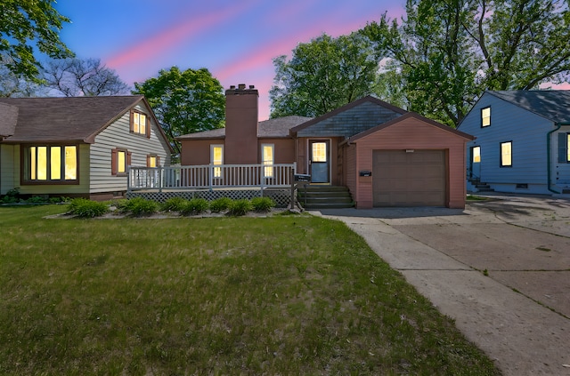 1202 Webster St, Fairmont, MN 56031 - view of front of home with driveway, a chimney, an attached garage, a lawn, and a deck