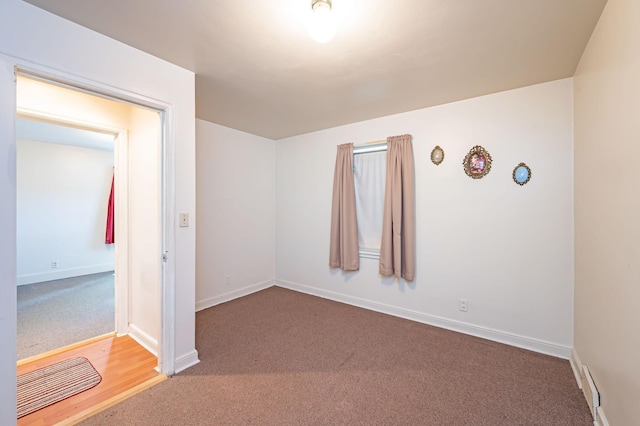 1202 Webster St, Fairmont, MN 56031 - spare room featuring carpet flooring and baseboards