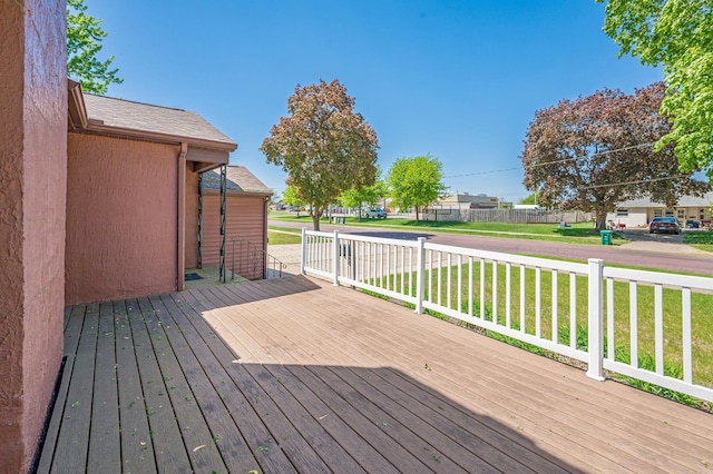 1202 Webster St, Fairmont, MN 56031 - wooden terrace with a lawn