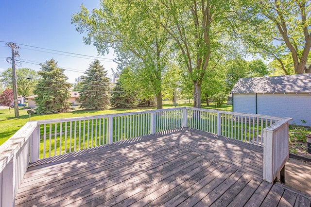 1202 Webster St, Fairmont, MN 56031 - wooden terrace featuring a lawn