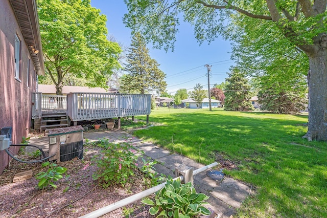 1202 Webster St, Fairmont, MN 56031 - view of grassy yard with a wooden deck