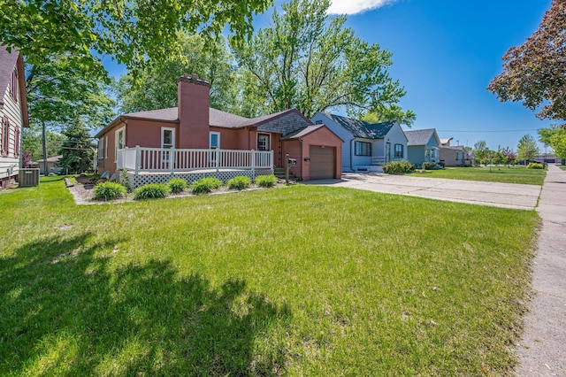 1202 Webster St, Fairmont, MN 56031 - ranch-style home featuring driveway, a chimney, an attached garage, a front yard, and central AC unit