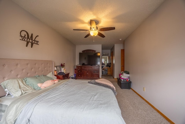 carpeted bedroom featuring a textured ceiling, a ceiling fan, and baseboards