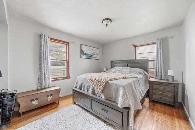 1204 12th Ave N, Moorhead, MN 56560 - bedroom with wood finished floors and baseboards