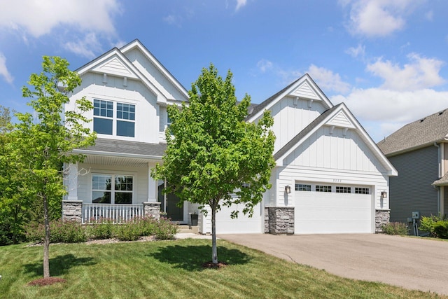 9222 Bridle Way, Victoria, MN 55386 - craftsman-style house with board and batten siding, stone siding, a garage, and concrete driveway