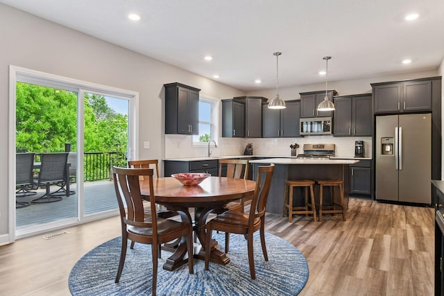 9222 Bridle Way, Victoria, MN 55386 - dining space featuring light wood finished floors and recessed lighting