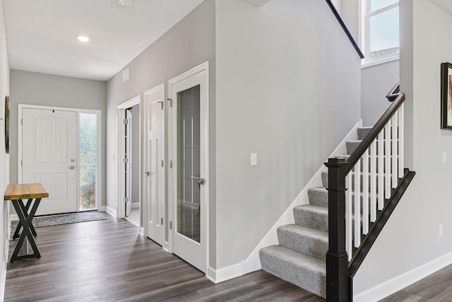 9222 Bridle Way, Victoria, MN 55386 - entryway with baseboards, dark wood-style flooring, stairway, and recessed lighting
