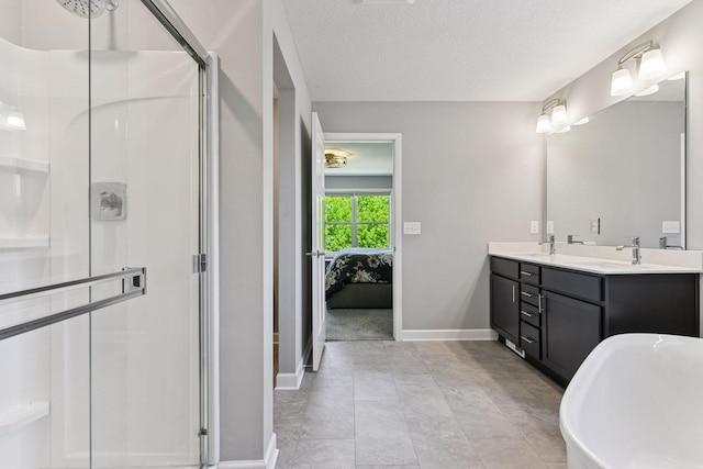 9222 Bridle Way, Victoria, MN 55386 - full bath featuring a shower stall, baseboards, double vanity, a textured ceiling, and a freestanding tub