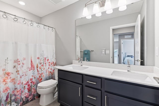 9222 Bridle Way, Victoria, MN 55386 - full bath with double vanity, ensuite bathroom, toilet, and a shower with shower curtain