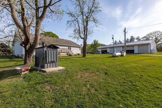 22842 530th St, Milton Twp, MN 55985 - view of green lawn with a garage and an outdoor structure