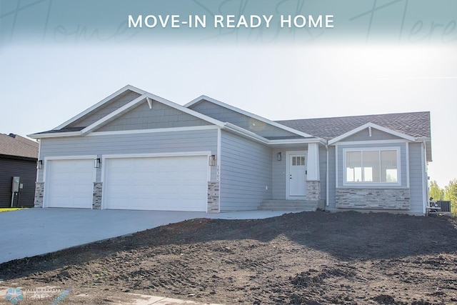 10302 Burgundy Dr, Horace, ND 58047 - craftsman house with stone siding, an attached garage, and driveway