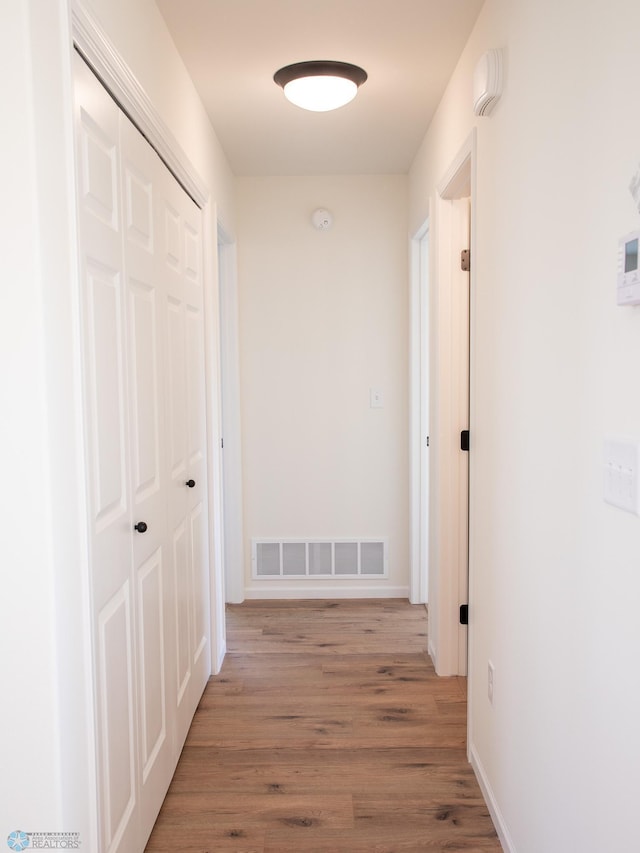 10302 Burgundy Dr, Horace, ND 58047 - corridor featuring light wood-style floors