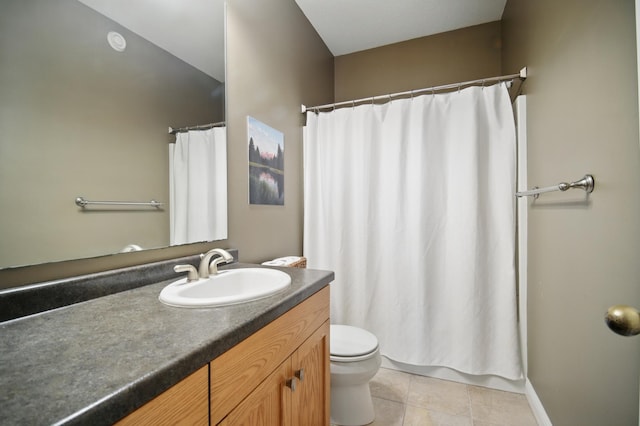 full bathroom featuring toilet, vanity, tile patterned floors, and a shower with curtain