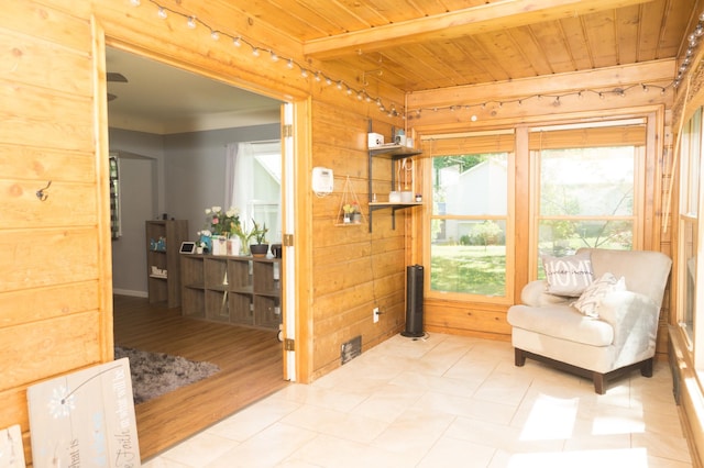 2417 S Ave E, North Saint Paul, MN 55109 - living area featuring wood ceiling with exposed beams and wooden walls