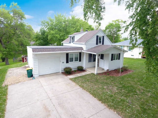 view of front of property with a garage, roof with shingles, covered porch, driveway, and a front yard