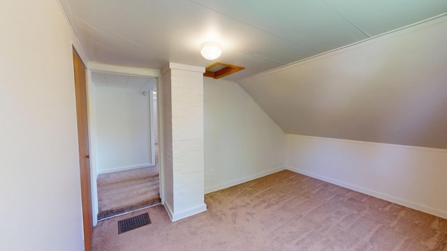 bonus room featuring carpet, lofted ceiling, and baseboards