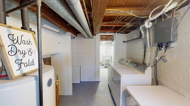 clothes washing area featuring separate washer and dryer and electric panel