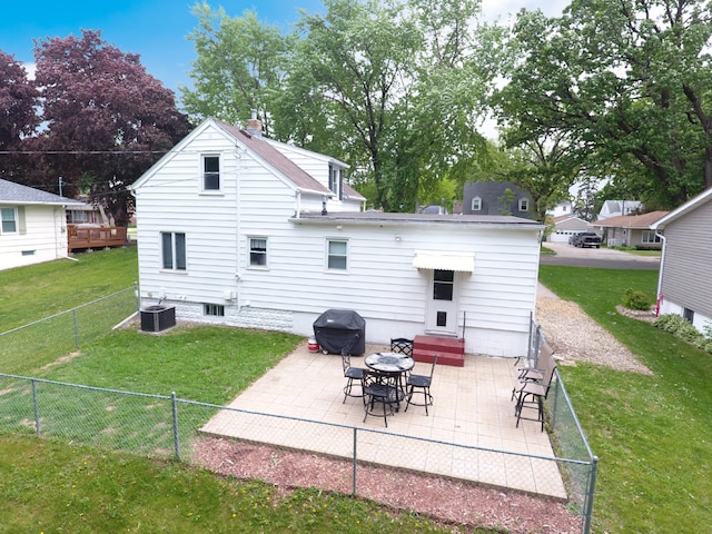 rear view of property with central air condition unit, a patio, and entry steps