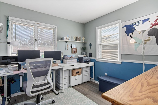 12420 Chippewa Ln, Burnsville, MN 55337 - office area with dark wood-style flooring and baseboards