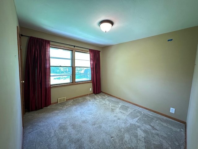 6617 Normandale Rd, Edina, MN 55435 - empty room featuring carpet flooring and baseboards