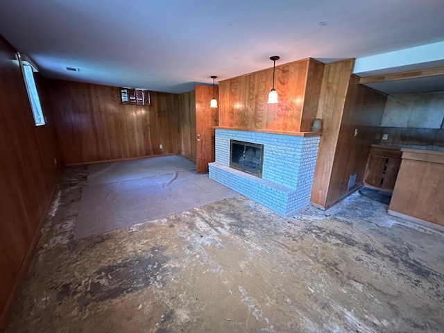 6617 Normandale Rd, Edina, MN 55435 - unfurnished living room featuring a brick fireplace and wooden walls