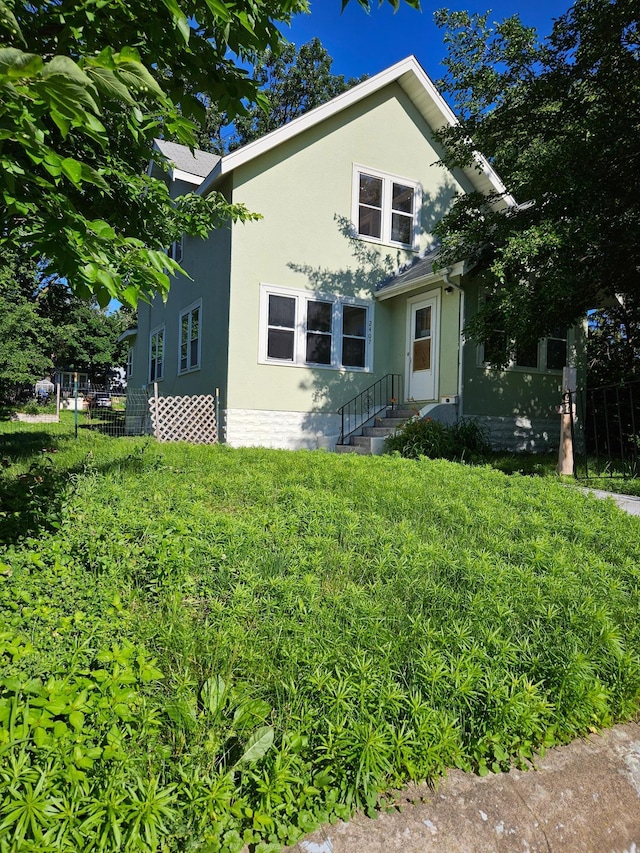 2407 4th St, Minneapolis, MN 55411 - view of front facade with stucco siding
