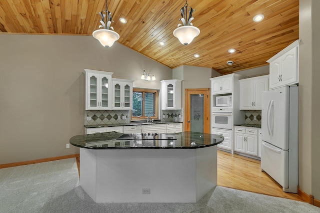 1108 Oak Pond Dr, Sartell, MN 56377 - kitchen featuring white appliances, wood ceiling, lofted ceiling, light carpet, and white cabinets