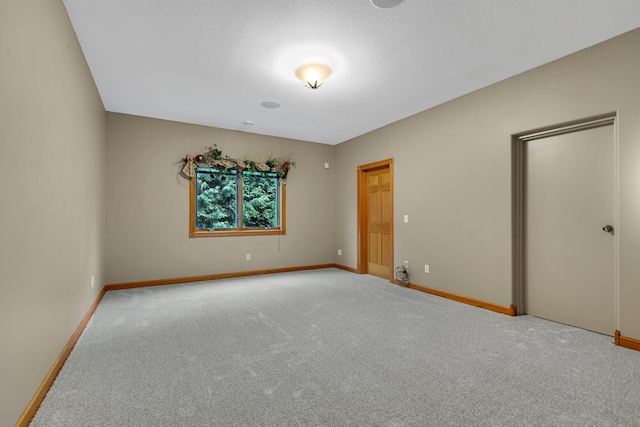 1108 Oak Pond Dr, Sartell, MN 56377 - empty room featuring carpet floors and baseboards