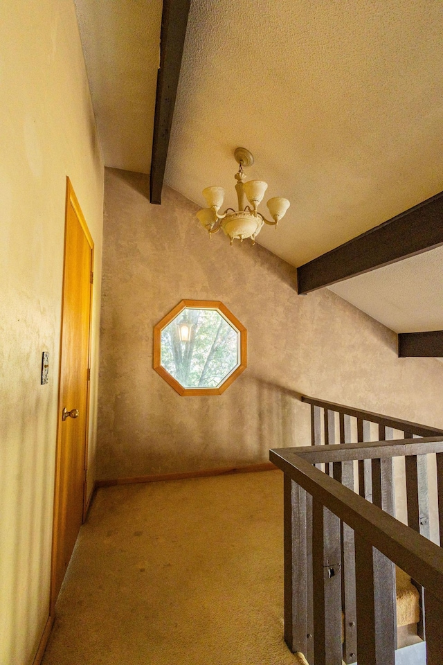 500 Lincoln St, Adams, MN 55909 - bonus room with a chandelier, beam ceiling, carpet floors, and a textured ceiling