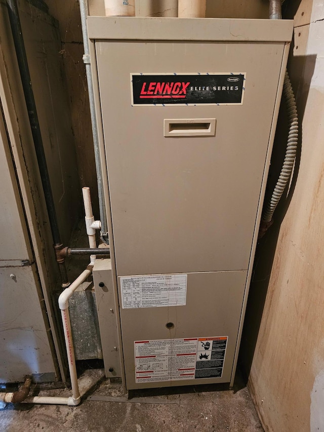 500 Lincoln St, Adams, MN 55909 - utility room featuring heating unit