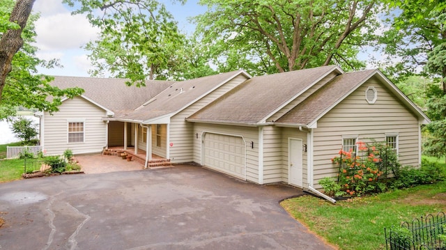 6 Shore Rd, North Oaks, MN 55127 - ranch-style house featuring an attached garage, driveway, and a shingled roof