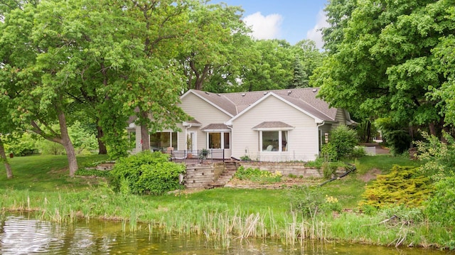 6 Shore Rd, North Oaks, MN 55127 - view of front of house featuring a water view