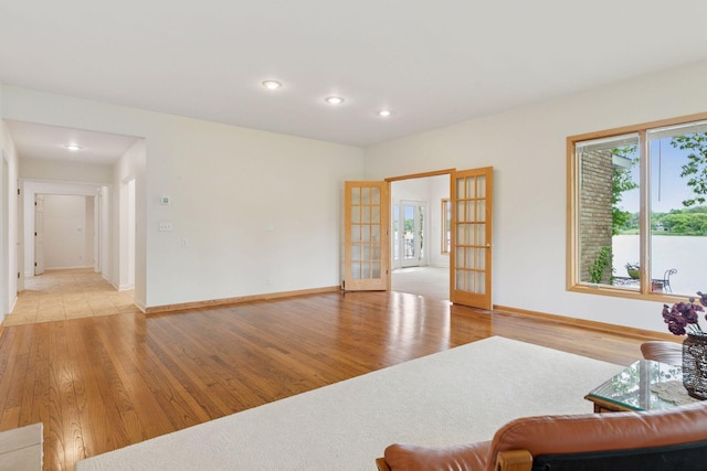 6 Shore Rd, North Oaks, MN 55127 - living room featuring french doors, light wood-style floors, recessed lighting, and baseboards
