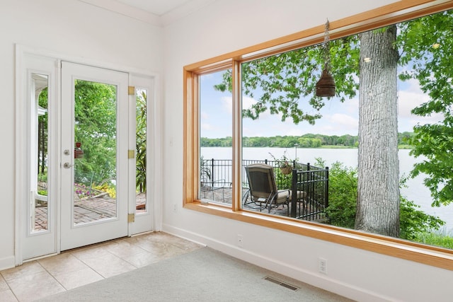 6 Shore Rd, North Oaks, MN 55127 - entryway with a water view, baseboards, and tile patterned flooring